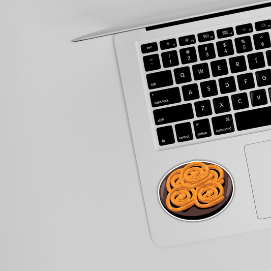 Cute food sticker with sweet jalebi design on a laptop, trendy stickers by Sticksnap
