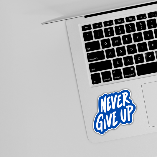 Laptop with blue 'Never Give Up' motivational sticker, trendy sticker design from Sticksnap
