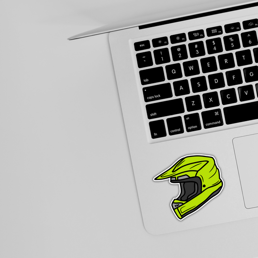 Laptop with a cute green helmet sticker, trendy sticker design from Sticksnap