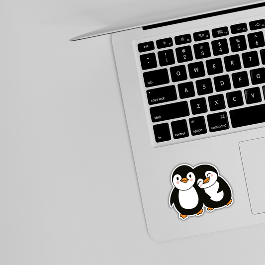 Cute penguin stickers on laptop keyboard, trendy vinyl design, buy stickers online Sticksnap