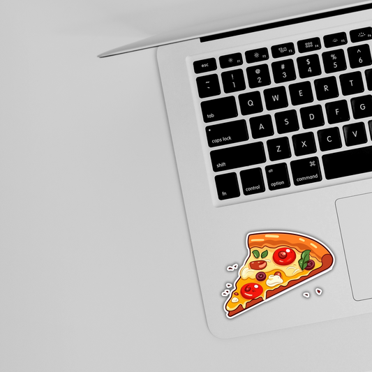 Cartoon pizza slice sticker on silver laptop keyboard, Sticksnap branding