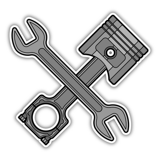 Sticksnap sticker design with crossed wrench and piston on white background
